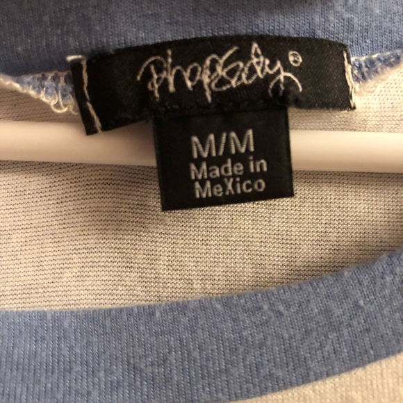 Cute white and baby blue T-shirt. Says. STAFF - Picture 2 of 2